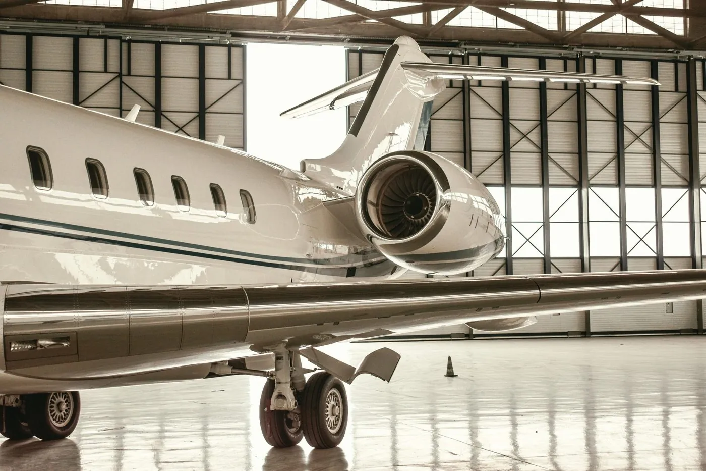 Private jet in hangar — based aircraft program